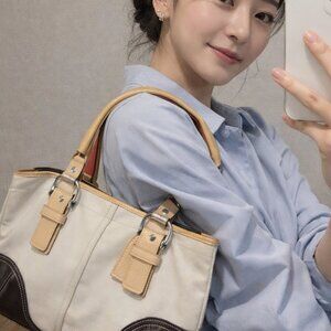 Coach brown leather and canvas bag